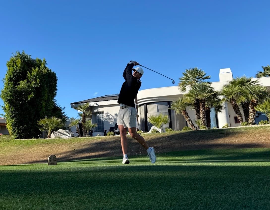 Nate Wojciechowski following through on a tee shot